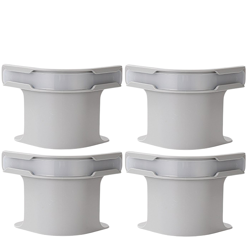 Four gray sheet holder clips on white background
